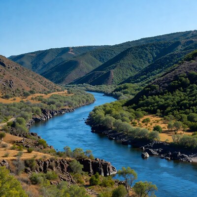 River Winding Through Green Mountains