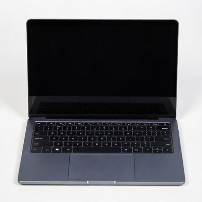 Open gray laptop on white background