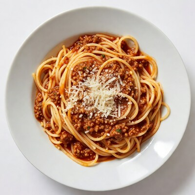 Spaghetti with meat sauce and parmesan