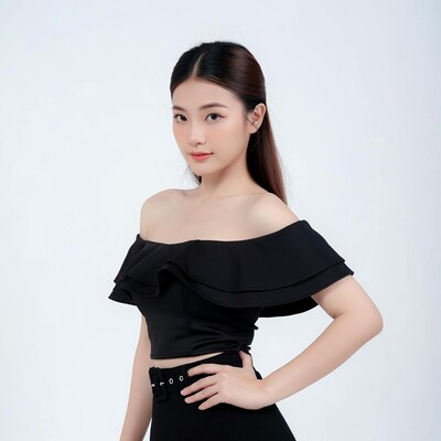 Asian woman in off-shoulder black top
