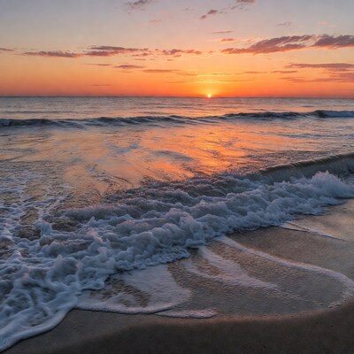 Sunset over ocean waves