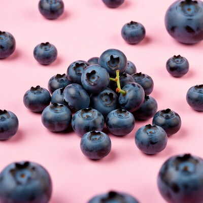 Blueberries on pink background