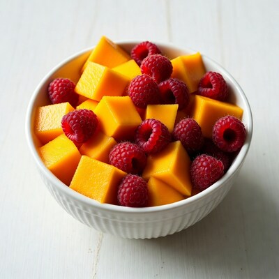 Mango Chunks and Raspberries in Bowl