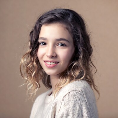 Smiling girl with wavy hair