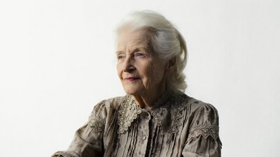 Elderly woman in lace blouse