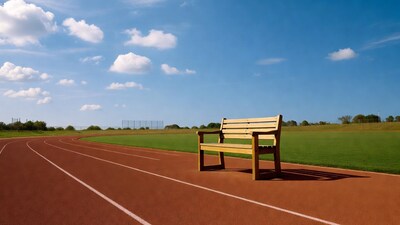 Wooden bench on running track