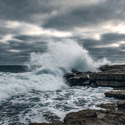 Ocean Wave Crashing on Rocks
