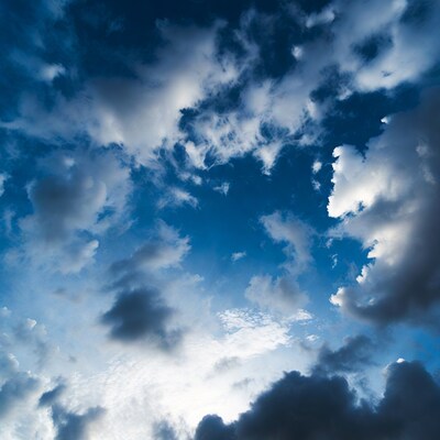 Blue sky with fluffy white clouds
