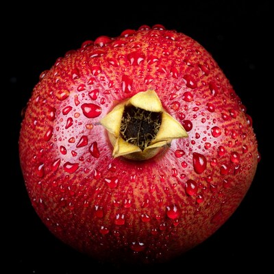 Pomegranate with water droplets
