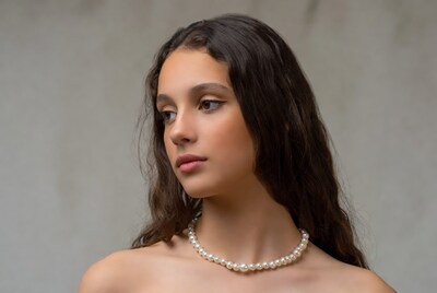 Young woman with pearl necklace