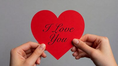 Hands holding I Love You heart