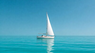 White sailboat on turquoise sea