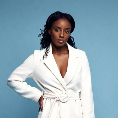 African-American woman in white blazer