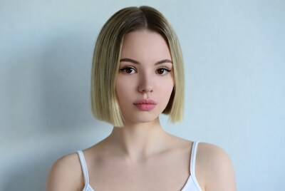 Young woman with blonde bob haircut