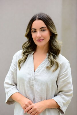Woman with balayage hair smiling