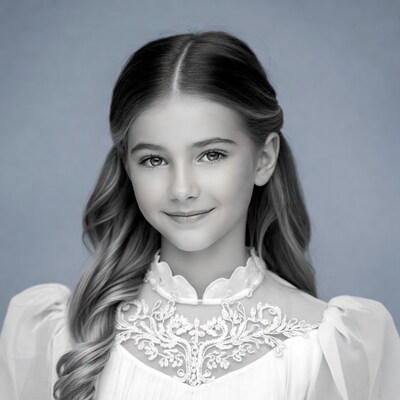 Girl in lace dress smiling