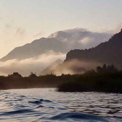 Misty Mountains Over Calm River