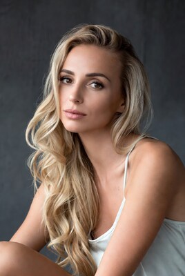 Blonde woman in white tank top