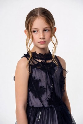 Girl in black lace tulle dress