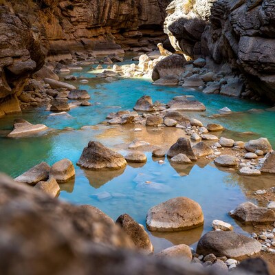 Turquoise river in narrow canyon