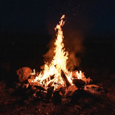 Campfire burning at night