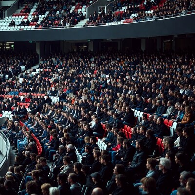 Crowded stadium audience seating