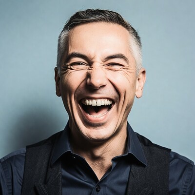 Man laughing with squinted eyes