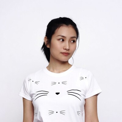Asian woman in cat print t-shirt