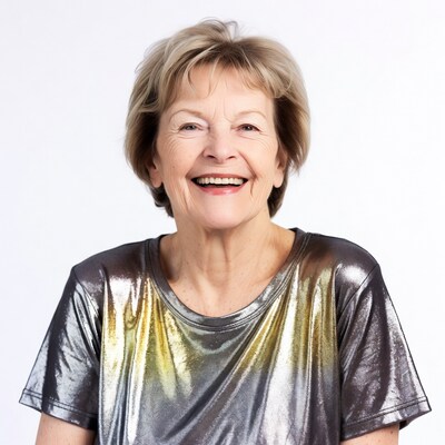 Smiling senior woman in metallic top