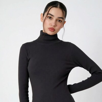 Woman in black turtleneck sweater