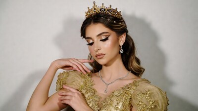 Woman in gold gown with crown