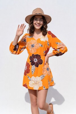 Smiling woman waving in floral dress