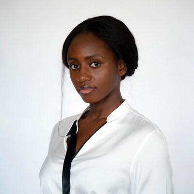 African-American woman in white blouse