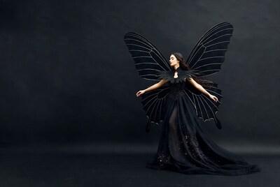 Woman with black butterfly wings