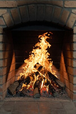 Blazing fire in brick fireplace