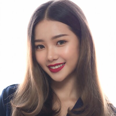 Asian woman smiling with red lipstick
