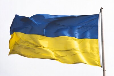 Ukrainian flag waving on pole