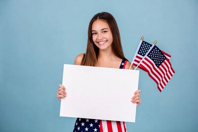 Girl holding blank sign with American flags