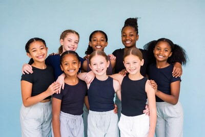 Group of diverse girls hugging