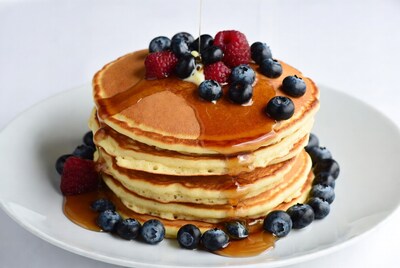Pancakes with blueberries and maple syrup
