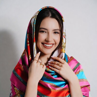 Smiling woman in colorful patterned headscarf