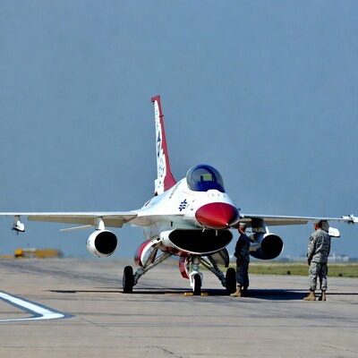 Thunderbirds F-16 Jet with Airmen on Tarmac