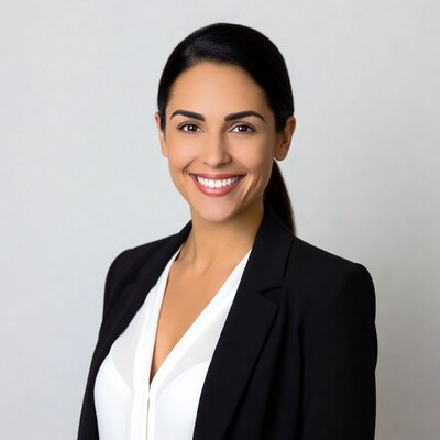 Smiling Latina woman in black blazer