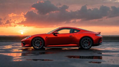 Red Porsche 911 GT3 RS at sunset