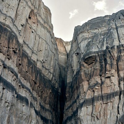 Towering Layered Rock Canyon Cliffs