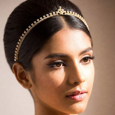 Indian woman wearing gold headband
