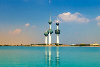 Kuwait Towers reflected in water