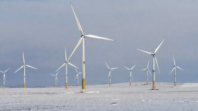 Wind Turbines in Snowy Field