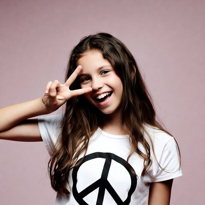 Girl making peace sign
