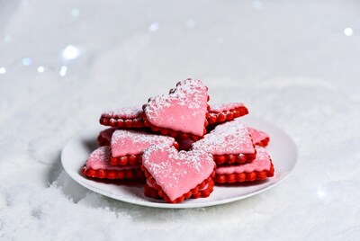 Pink heart cookies with powdered sugar